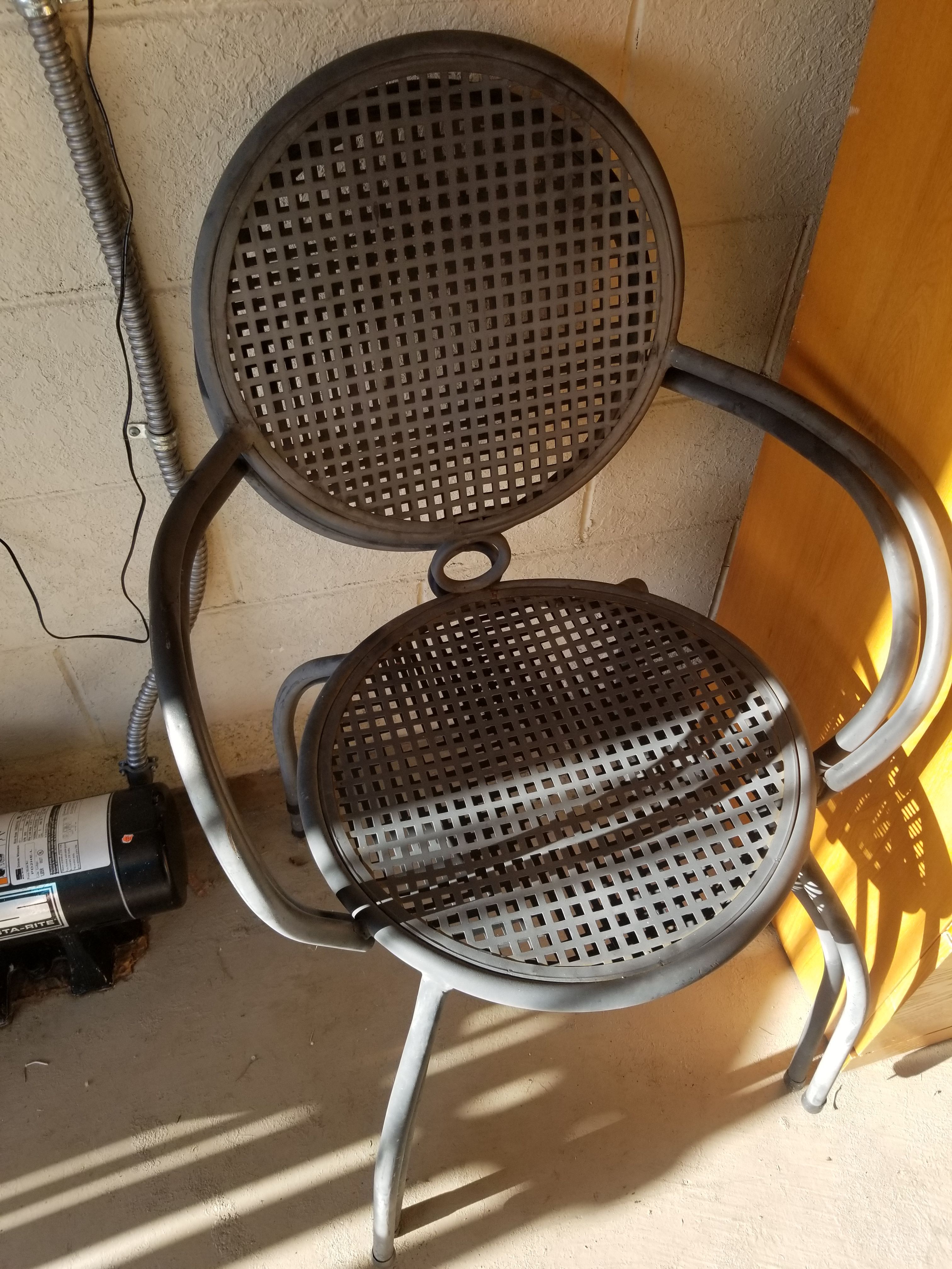 2 metal outdoor chairs