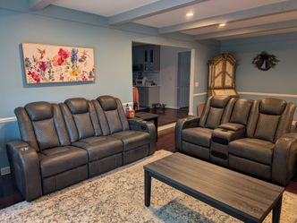 Power Reclining Sofa and Loveseat set with Audio Center Console