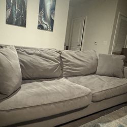 Gray 2 seat couch with ottoman