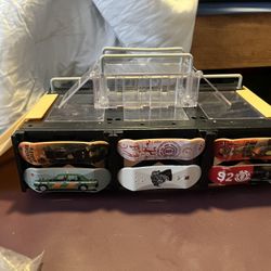 tech deck double ramp with skateboard holder on side