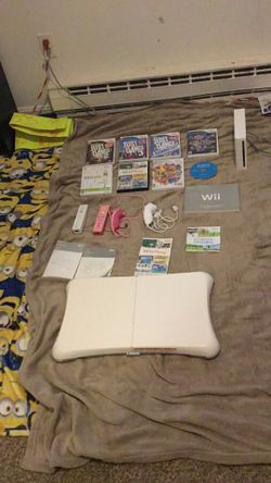 8 Wii Games 4 Wii Controller 5 Wii Instruction Booklets Wii Fit Balance Board Wii Console