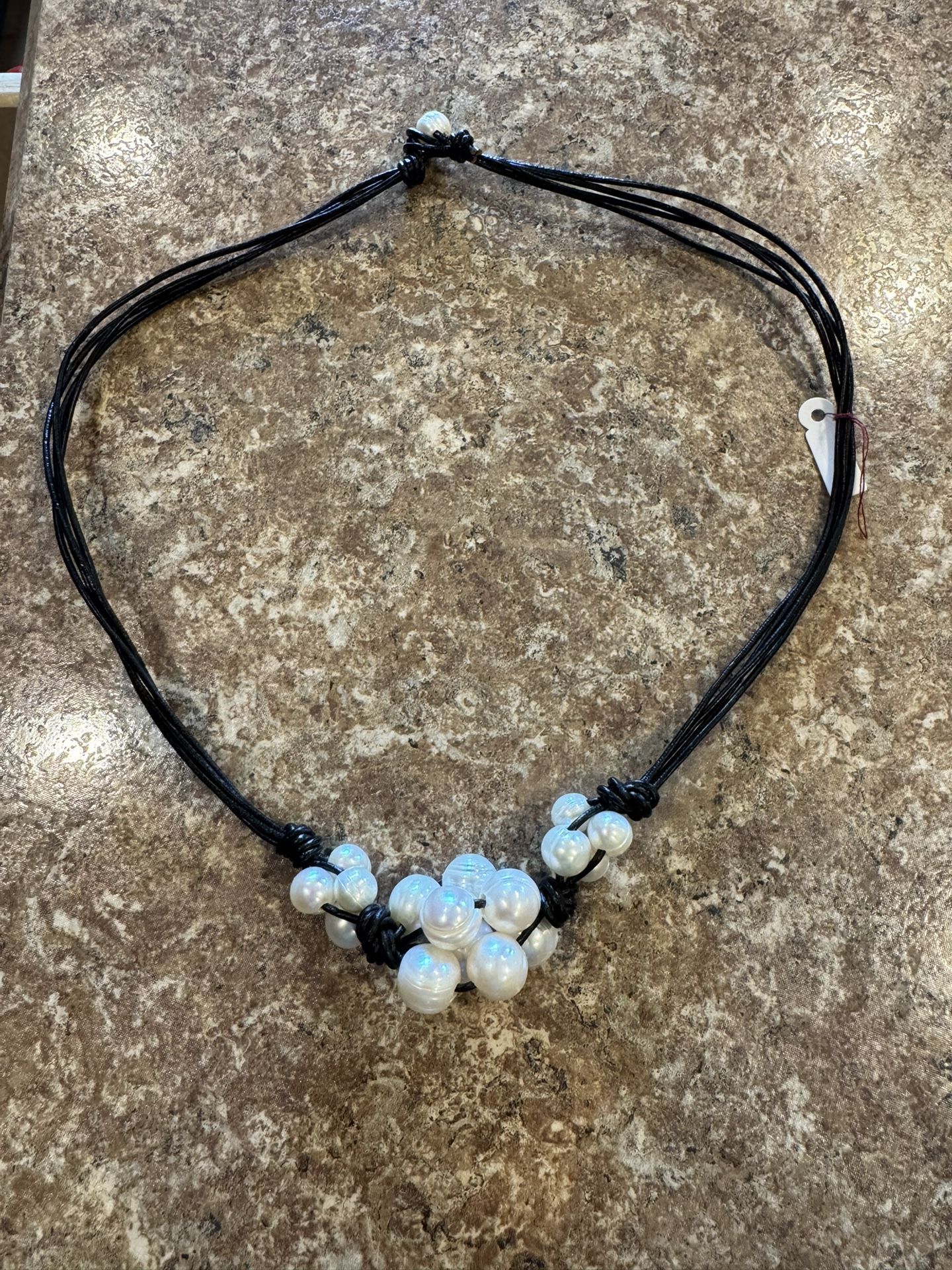 Woman’s new leather wheel, pearl necklace shipping available