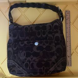 Brown Coach Purse With Braided Strap And Coach Logo