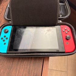 Nintendo Switch Handheld Console with Case, 32 GB, Neon Blue and Red