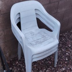 Three Plastic Chairs