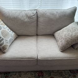 A Couch And Love Seat 