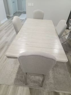 Ashley furniture large dining room table ans chairs