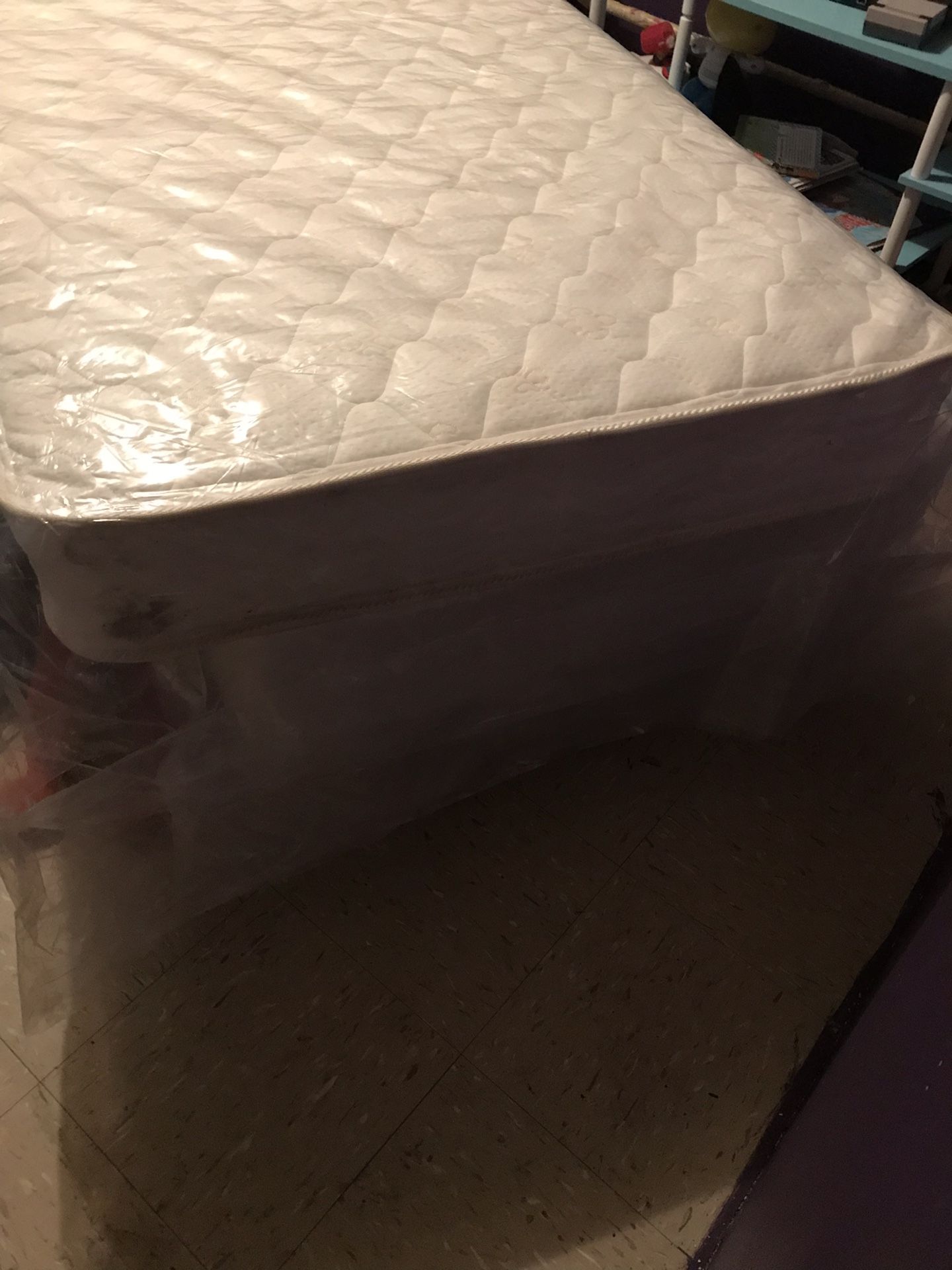Brand new twin mattress ,box spring, and frame