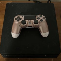 Playstation 4 with rose gold controller