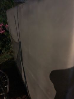 Bed cover for a extended cab