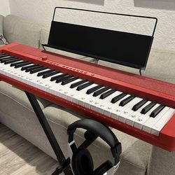 Casio Electric piano console Black or red