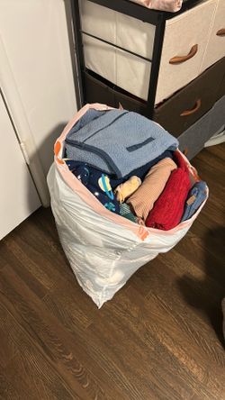 Full bag of baby boy clothes