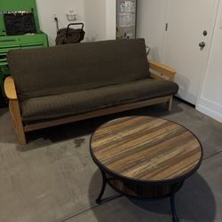 Futon and round coffee table 