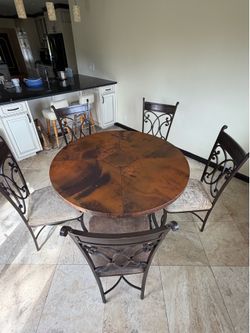 Copper Wrought Iron Dining Table and 5 matching chairs