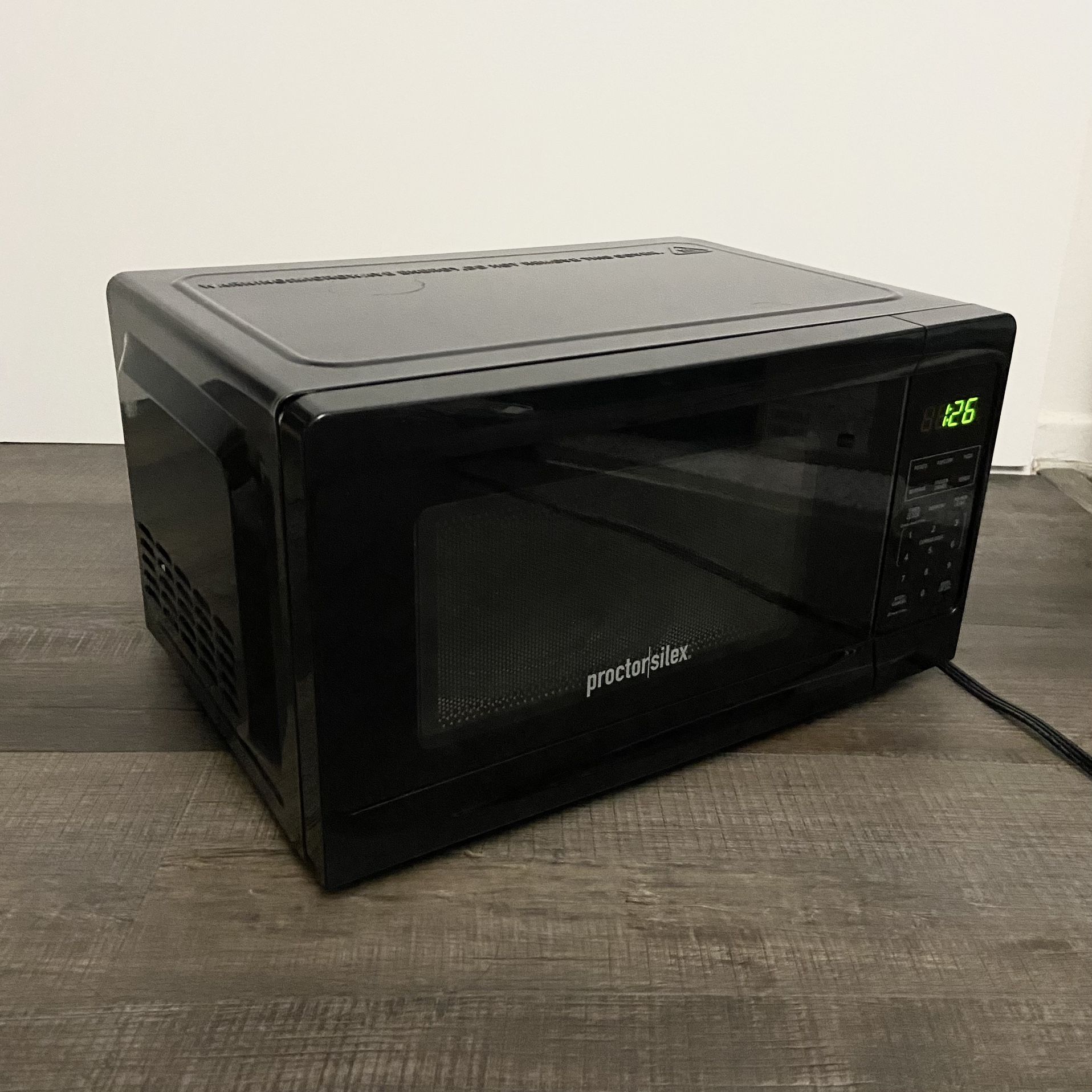 Proctor Silex 1100W Microwave Oven •0.7 Cu ft •Turntable Glass Diameter 9 ⅝” •in mint condition, super clean •Model PSCMV807BK07