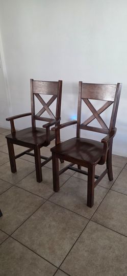 2 wood dining chairs