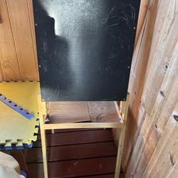A frame chalkboard/whiteboard with tray for chalk and markers