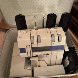 Huskylock by Viking 1000L Serger and Husqvarna Embroidery Sewing Machine 300 Anniversary