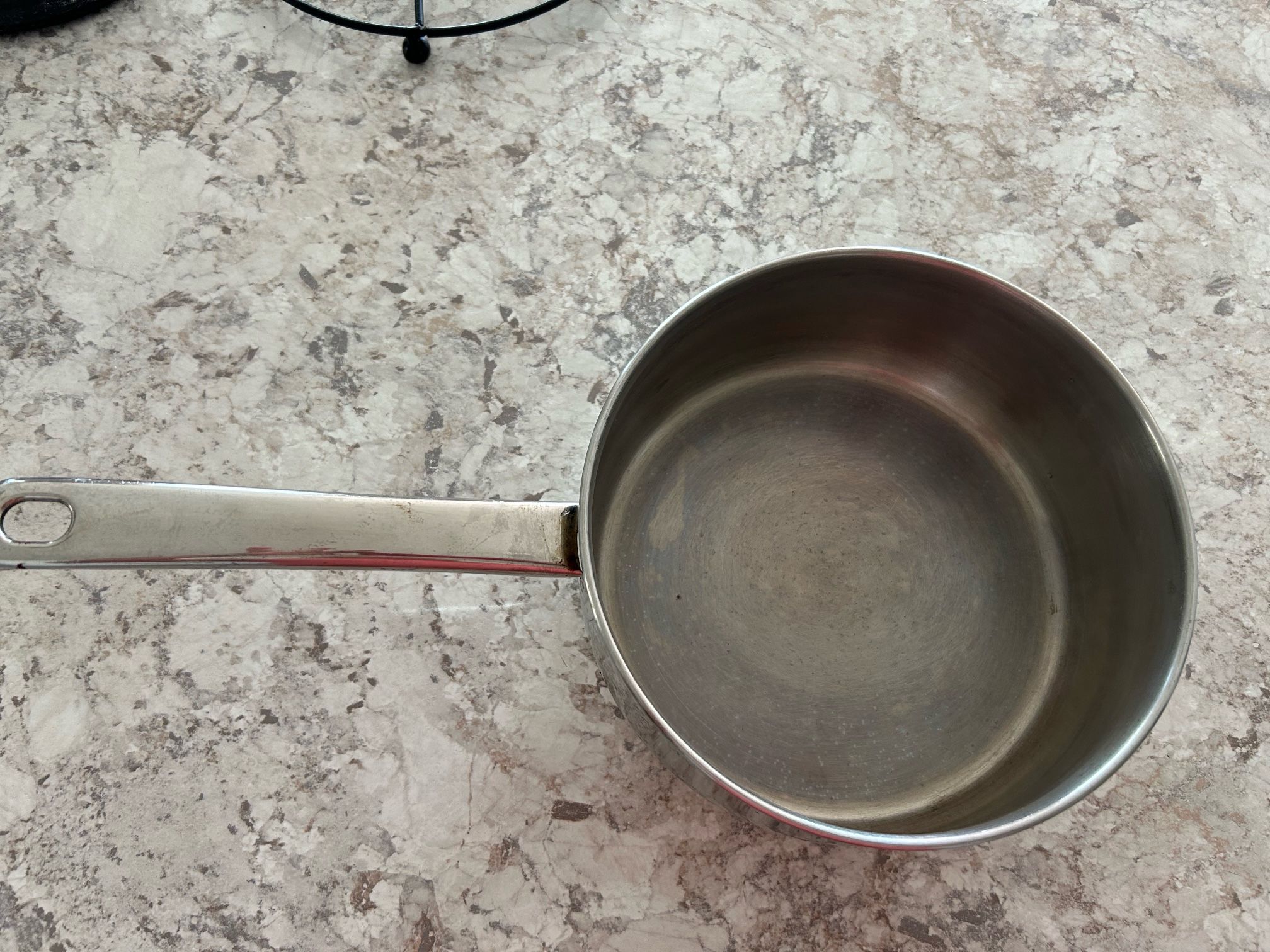Stainless steel pot width 8”, height 3 1/2”, 7 1/2” handle length. Without lid. In perfect condition