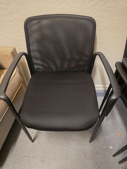 Six mesh guest chairs from Staples