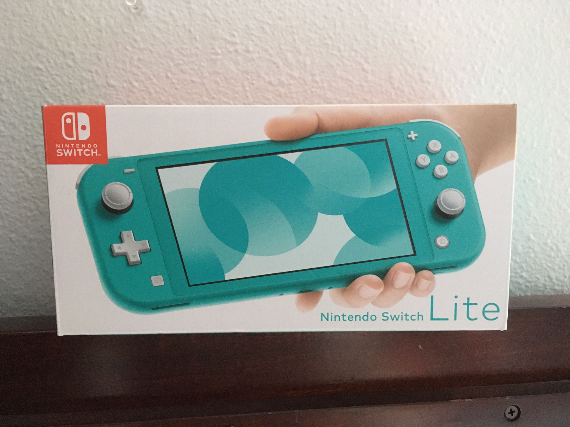 Nintendo Switch Lite. Brand new in hand. Turquoise in color. Cash only no trades. $260 firm