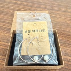 Silver hoops with pearl accents minimalist, stylish, and brand new.