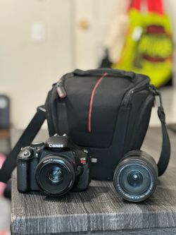 Canon camera w/ 2 lenses