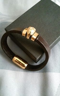 Men Leather and gold plated bracelet