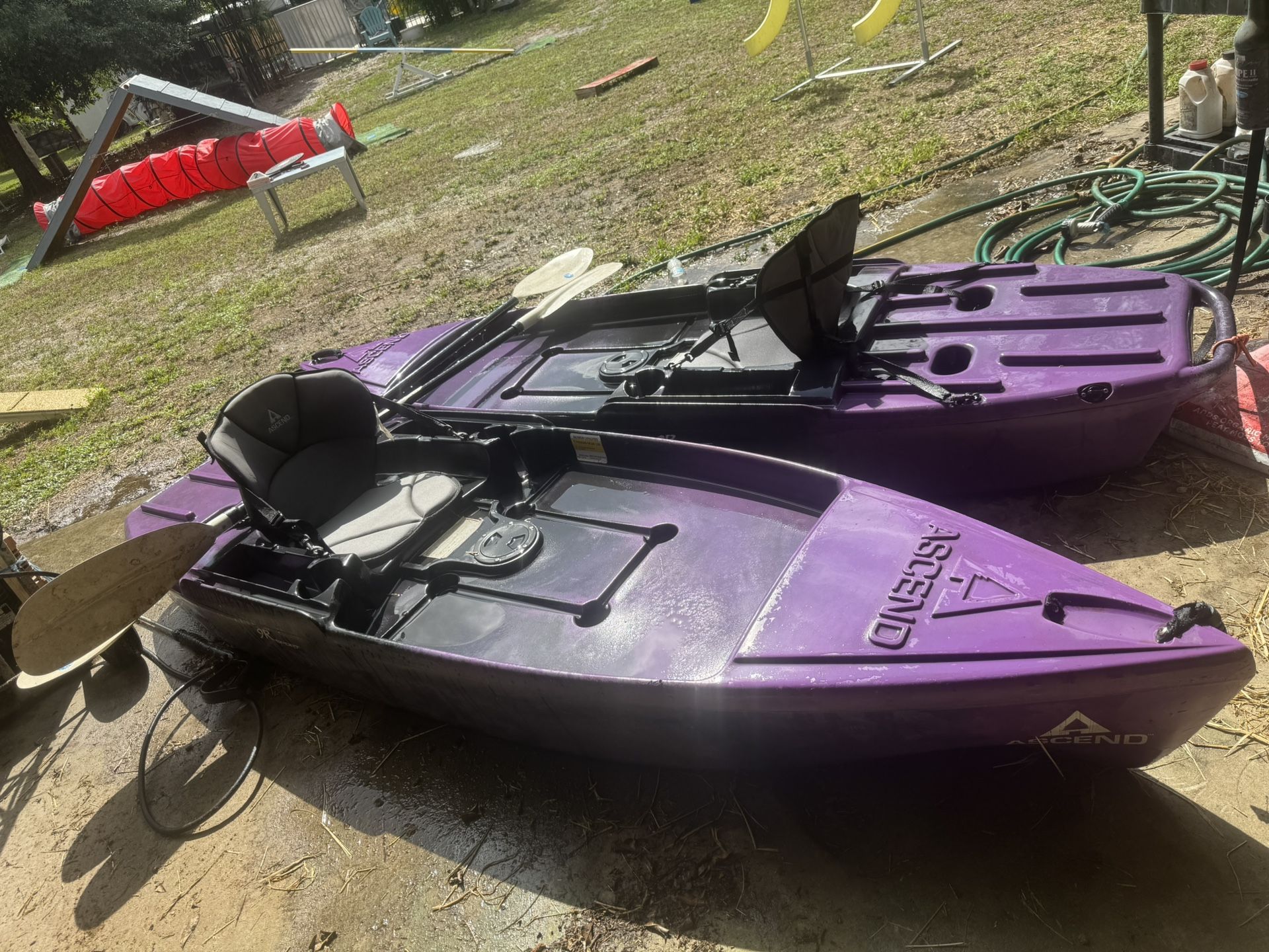 Ascend 10 foot kayaks, two of them with paddles
