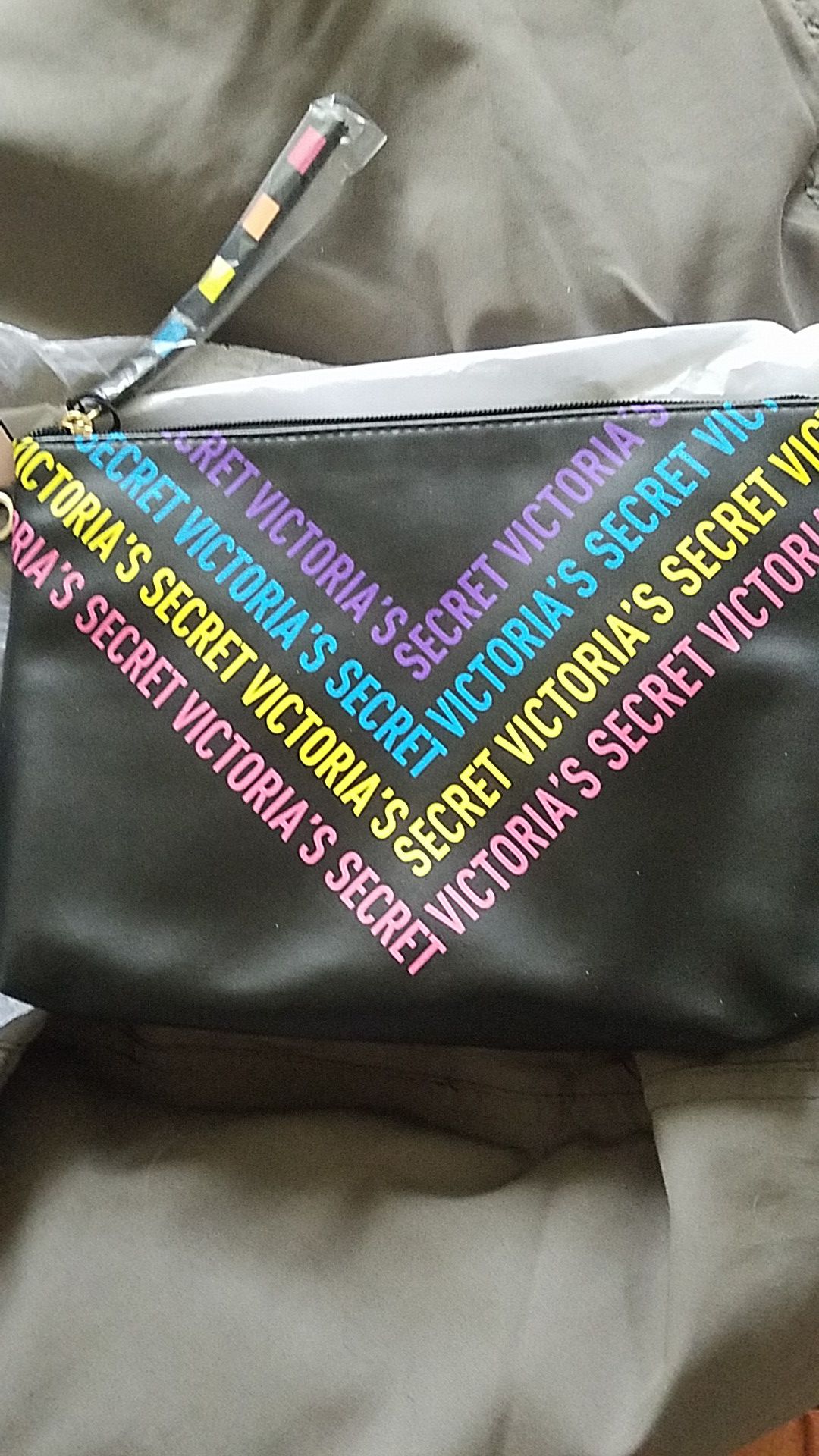 Victoria's Secret wristlet black with Victoria's Secret written on it new with tags