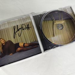 Hilary Duff CD luck or something  *signed -autopen ?