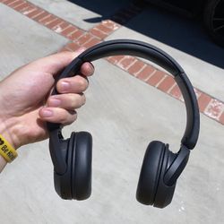 Black Sony wireless bluetooth headphones. 