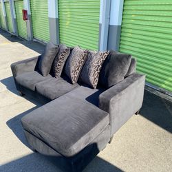 Free Delivery reversible, black sectional couch