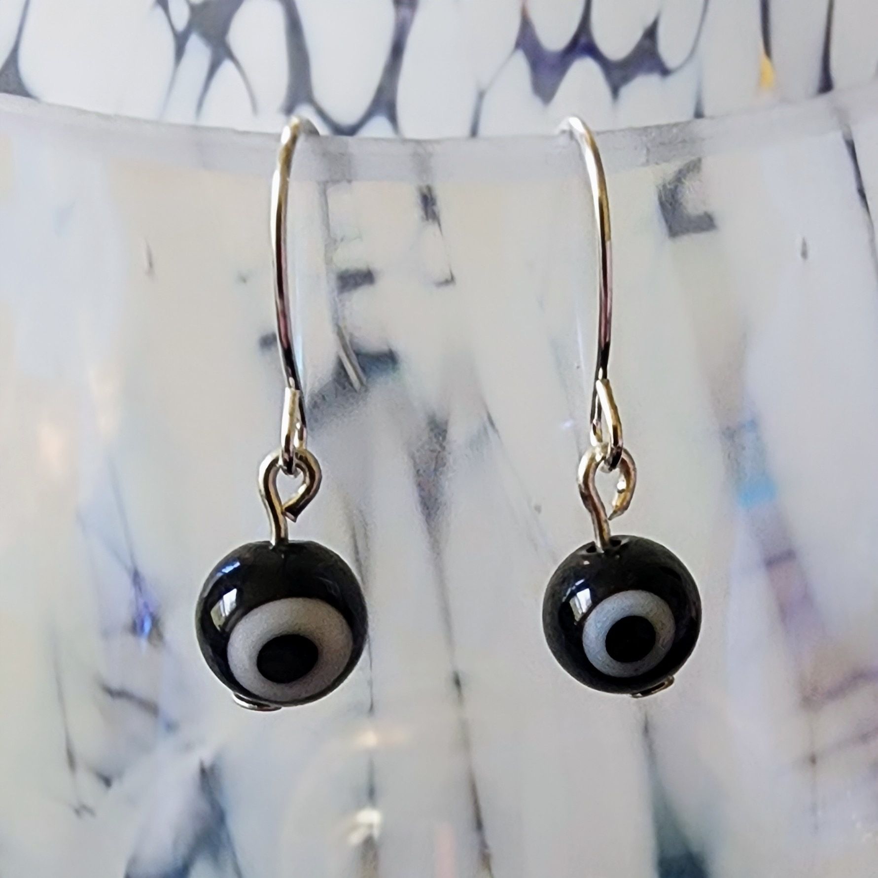 Evil Eye And Silver Earrings
