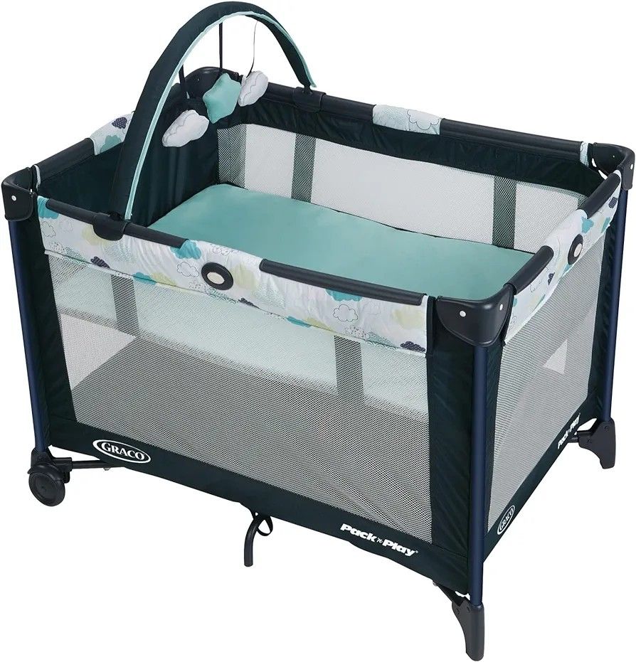 New In Box Graco Pack N Play Stratus With Bassinet, Toy Arch