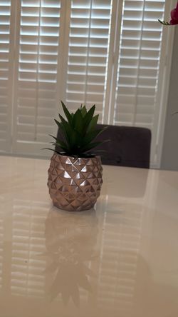 Rose gold pineapple fake plant
