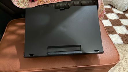 $3 laptop / iPad stand - can use while relaxing on the couch - there is a cushion under the stand