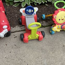 Kids Push Toys and A Stroller, toys are $5 each, Stroller $10