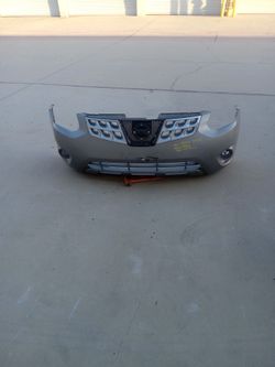 11 to 13 front bumper and grille nissan rogue ( oem)