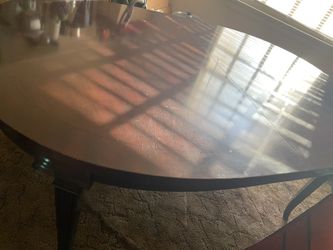 Wood cherry color dinning table no chairs included they were sold separately