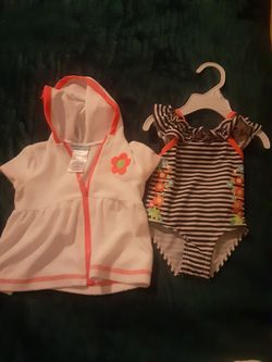 3-6 mos bathing suit and cover up.