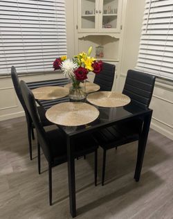 Black glass dining table