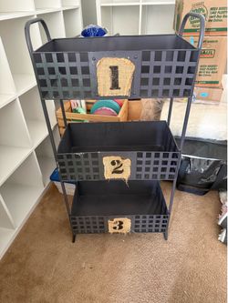 Metal basket stand.