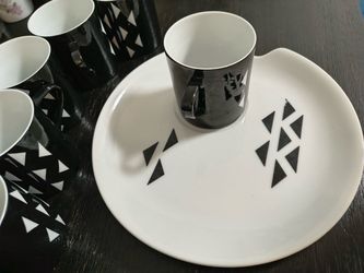 12-Piece Modern Black & White Geometric Coffee Mug & Plate Set (Service for 6) - $25