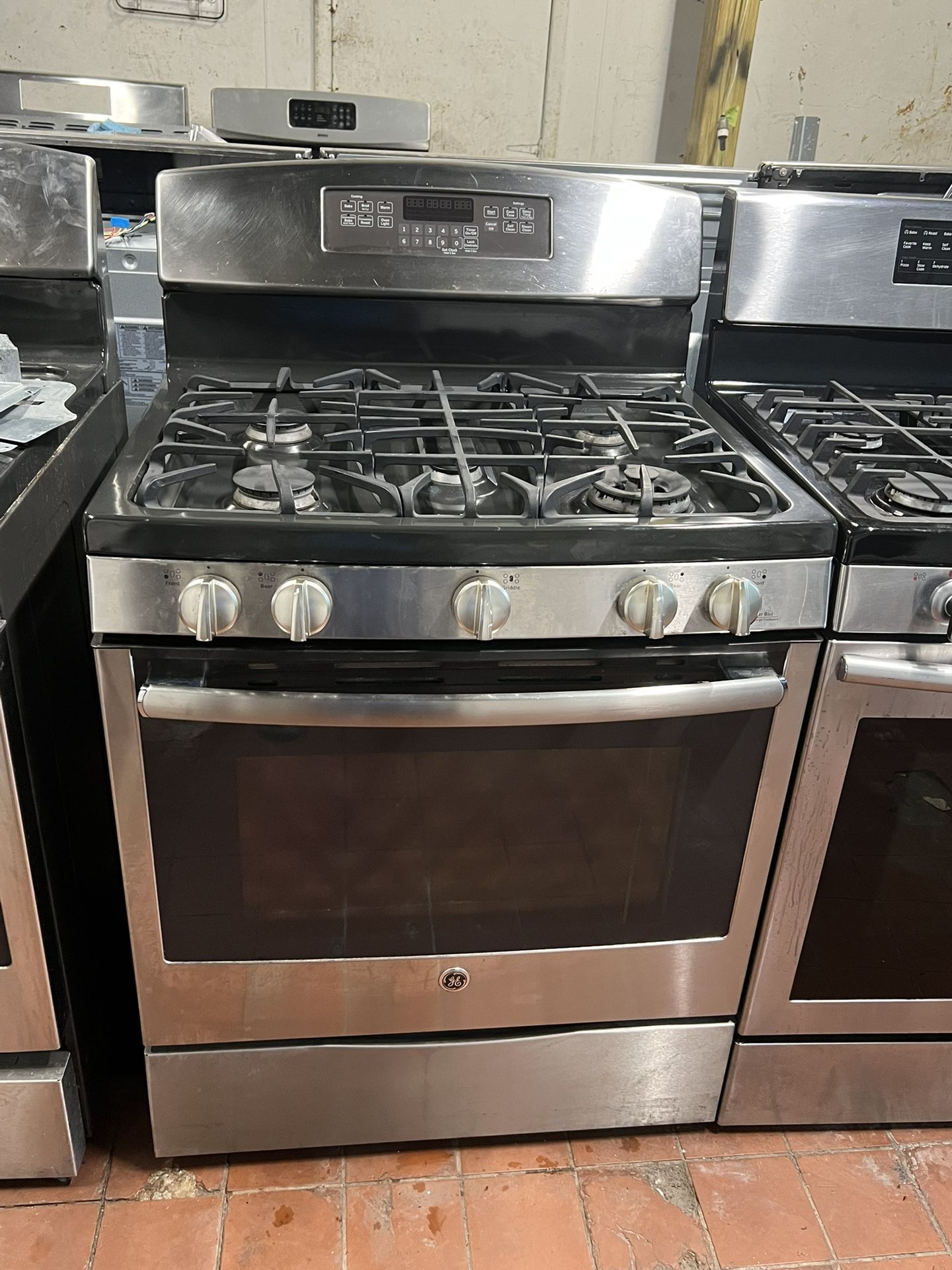 GE 30 inch W” 5 burner stainless steel gas range / estufa de gas