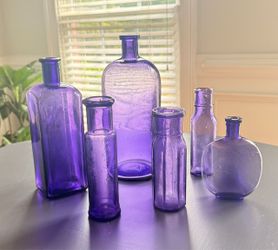 Vintage solarized (sun-purpled) manganese glass bottles Purple Glass Bottle Collection – Set of 7