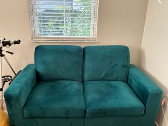 Emerald green two cushion loveseat