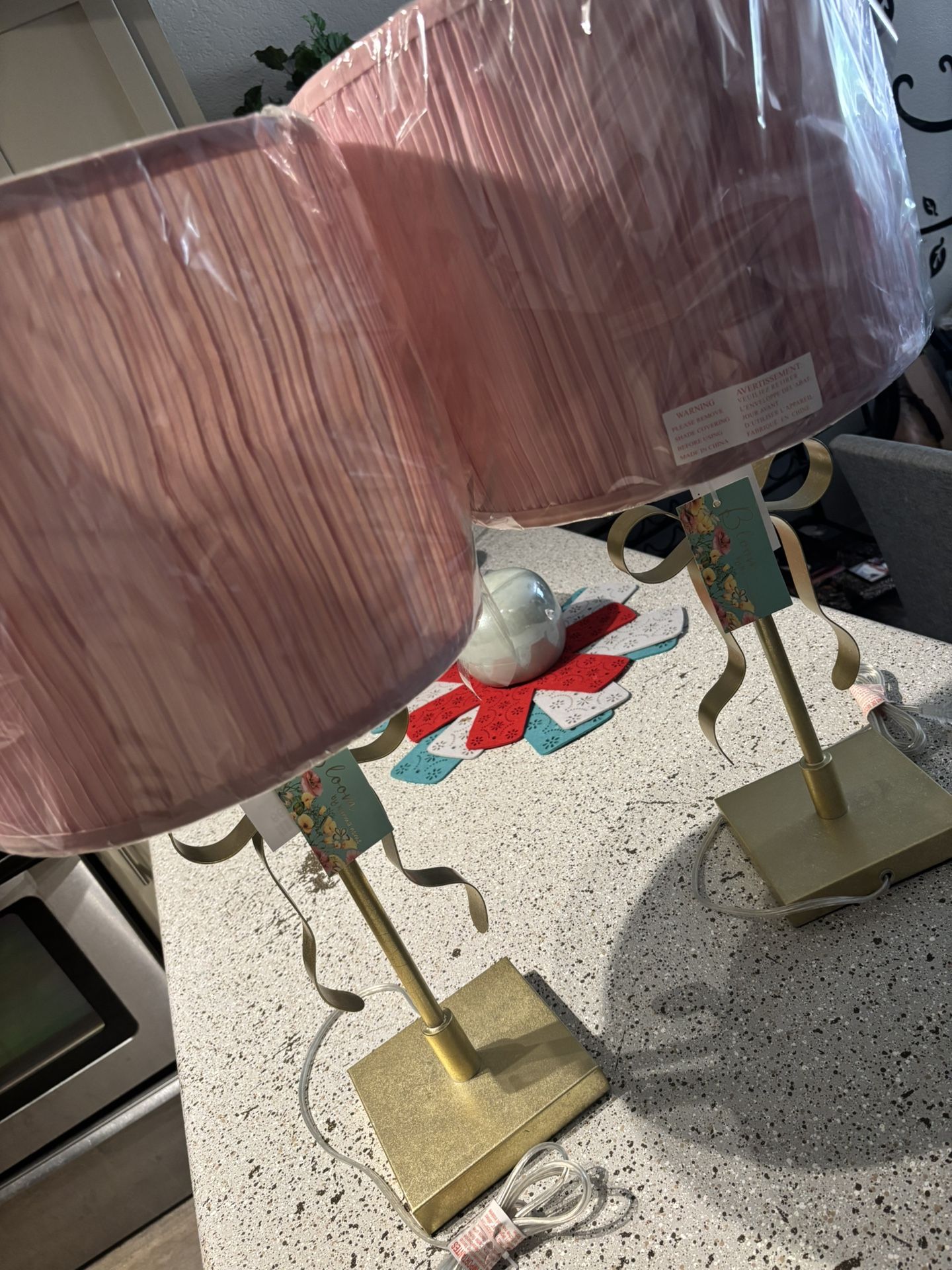 Glam Lamps, Ottomans And Wall Decor