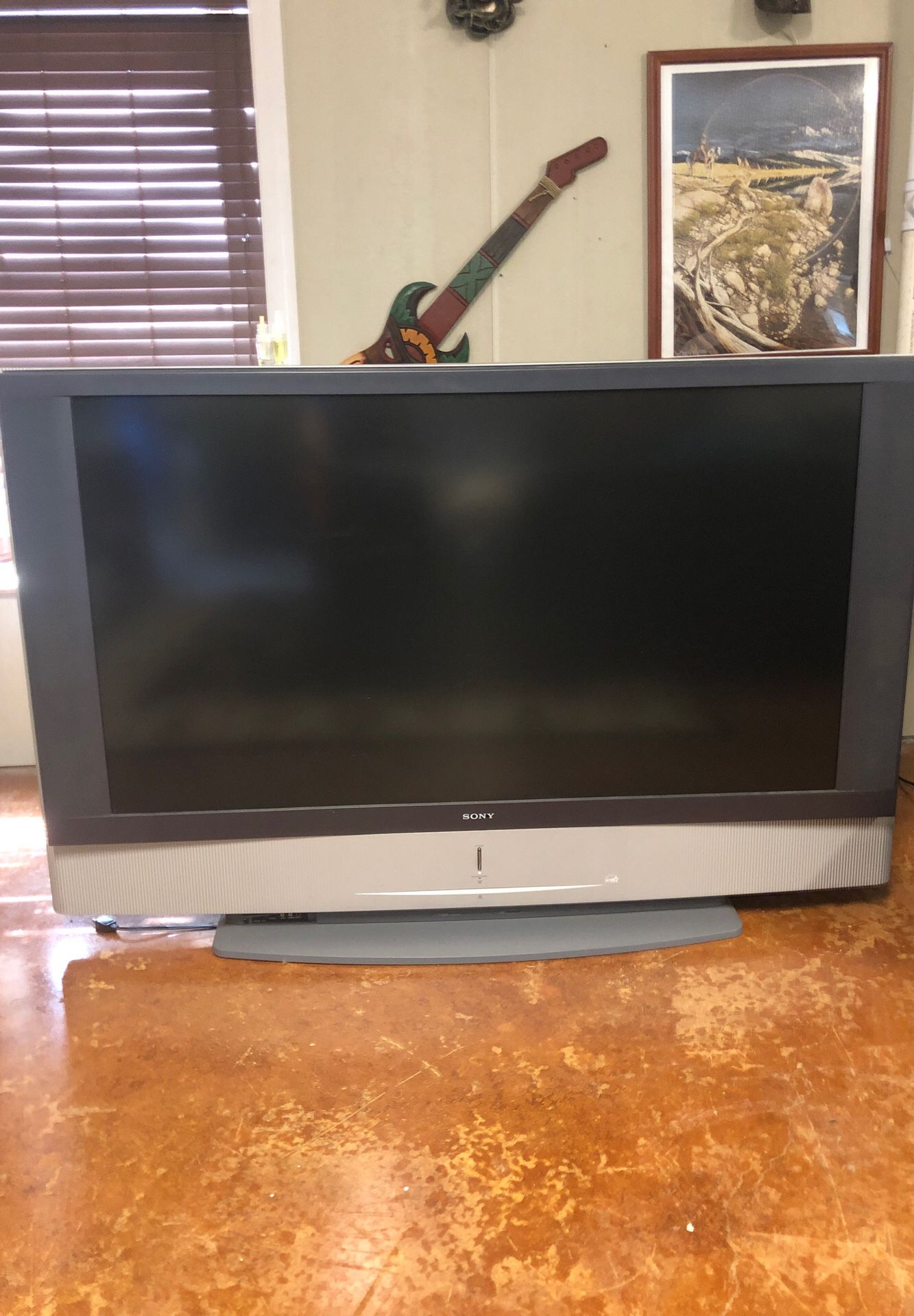 60’’ Sony tv, two 20 inch TVs: a Sylvania with a build in DVD player and Panasonic with a VHS player, and a 25 inch Sanyo tv. Also included is the tv