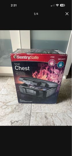New never used SentrySafe Fireproof Money Safe with Key Lock, Black Lock Box with Portable Carrying